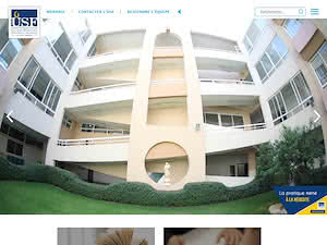 جامعة العائلة المقدسة's official website homepage screenshot